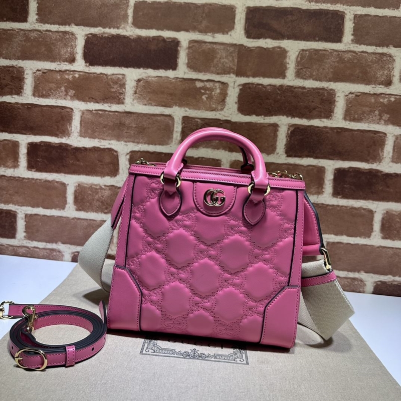 G*u*i shopping bags
